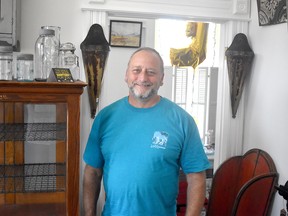 Repurposed Artisan Designs owner Bill Leach stands in his new store at 48 Albert St. in Clinton. Daniel Caudle