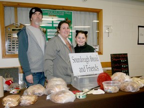 Patrick Irwin and Natalie Slaght with their daughter Madison Irwin stand with their Sourdough Bread and Friends booth during the first day of the Seaforth Community Market at the Agriplex on Dec. 5. The market will be held every Thursday from 3-7 p.m. Scott Nixon photo