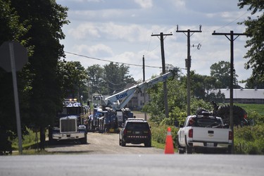 Daniel Road just off Plank Line in South-West Oxford remained closed for much of Tuesday afternoon as crews worked on scene after a crash between a tractor and a train. (Kathleen Saylors/Woodstock Sentinel-Review)