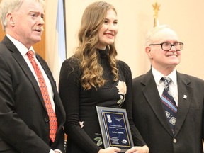 Amber Harding receiving her City of Sarnia Accessibility Award from Sarnia Mayor Mike Bradley and Coun. Terry Burrell in 2019. The Sarnia Accessibility Advisory Committee is looking for nominees – businesses and individuals – who have helped make the city more accessible for the 2020 iteration of the awards. File photo/Postmedia Network