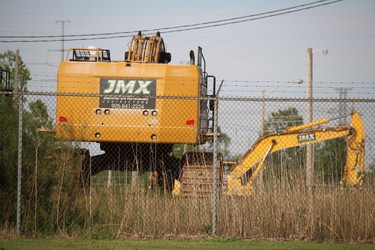 Heavy equipment sites idle at the Lambton Generating Station.