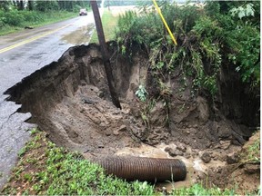 A Waterford contractor is undertaking repairs to Norfolk Road 45 near Langton after a torrential downpour July 11 washed out a section of the roadbed. Total value of the work is estimated at $60,000. – Norfolk OPP photo