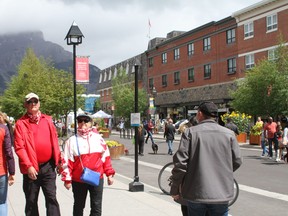 Town says the goal is to make Banff a safe visitor destination that all Albertans can confidently visit, getting 100,000 masks from the provincial government and hiring six safety ambassadors to hand out the masks free of charge seven days a week starting July 18. Councillors also unanimously voted to support looking at the possibility of mandating the wearing of masks both indoors and in outdoor public areas. A bylaw is currently being created by administration to be discussed in August. Photo Marie Conboy/ Postmedia.