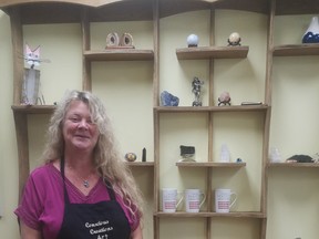 CORRECTION: Cindy Pearce, of Conscious Creations Art in Ripley is not a palm reader, but is an insightful psychic reader who channels with angels - be it hers or yours.