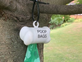 Disposable poop bags for dog-walkers have been put up in various sections of Mitchell - just in case they're needed. ANDY BADER/MITCHELL ADVOCATE