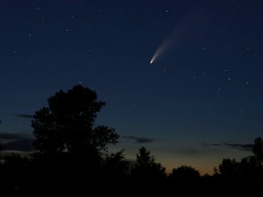 The comet NEOWISE passes through the sky north of Kingston, Ont. on Wednesday, July 15, 2020. The comet, named after the satellite that spotted it in late March, is to be visible for most of July in the northern hemisphere. It won't be visible from the Earth again for 6,800 years. Elliot Ferguson/The Whig-Standard/Postmedia Network