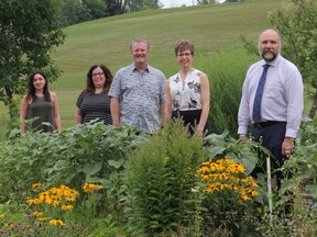 The City of Pembroke, the Keeping Pembroke Beautiful volunteer committee and Carefor have teamed up to create a community garden project on land situated behind the Carefor Mackay Street Complex, near River Road. In the photo from left, Sarah Neadow, Carefor communications and fundraising specialist, Leigh Costello, chairwoman of the Keeping Pembroke Beautiful Committee, Coun. Brian Abdallah, Sharon Maye, Carefor director of operations and programs and Deputy Mayor Ron Gervais. Anthony Dixon