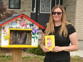 Stratford author Jennifer Honeybourn is celebrating last week’s release of her fourth young-adult novel, The Do-Over, by hiding a $25 gift certificate to a local bookstore in one of ten signed copies of her new book, all of which she has placed in little, free libraries -- like the one pictured -- throughout Stratford. Galen Simmons/The Beacon Herald/Postmedia Network