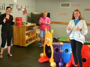 After being nominated by her bosses -- child and youth supervisor Tasha Scott (left) and Stratford-Perth YMCA CEO Mimi Price (centre) -- for the 2020 Ted Rogers Scholarship, 18-year-old Bella Gingerich (right) recently learned she will be one of only 150 recipients of the scholarship this year, scoring $2,500 annually for her four-year program at Wilfrid Laurier University. Galen Simmons/The Beacon Herald/Postmedia Network