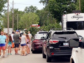 A storm July 19 knocked a tree and live power lines across Erie Boulevard in Long Point. This blocked the only access road into the resort community for several hours, raising concerns about the delivery of emergency services during an exceedingly busy weekend. – Contributed photo