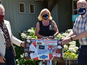 Touring around the province, Lisa MacLeod, minister of heritage, sport, tourism and culture industries, is collecting stickers from every community to add to her travelling suitcase. From left, Merrickville-Wolford Mayor Doug Struthers, MacLeod and Steve Clark, MPP and minister of municipal affairs and housing, make a stop at Nana B's Bakery in Merrickville on Friday.
Heddy Sorour/Local Journalism Initiative/The Recorder and Times