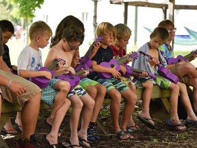 Children play ukuleles at Kenesserie Camp near Dresden in 2019. The camp is projecting a $60,000 deficit this year as its summer camp program was cancelled because of restrictions related to COVID-19. (Handout/Postmedia Network)