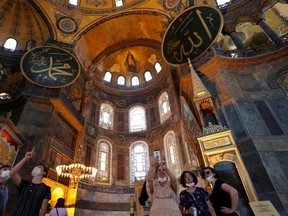 People visit Hagia Sophia or Ayasofya, a UNESCO World Heritage Site, in Istanbul, Turkey, June 30, 2020. Picture taken June 30, 2020. REUTERS/Murad Sezer ORG XMIT: HFS-IST08