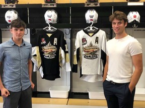 New players Sam Williamson, left, and Sam D'Amico stand in the Trenton Golden Hawks' dressing room on Friday in Trenton.