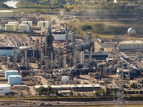 An aerial view of the Suncor refinery in Edmonton on Sept. 10, 2015. The plant leaked hydrogen sulphide on July 18, 2018, sending a "handful" of workers to hospital. That incident has lead to the province issuing seven environmental charges against Suncor Energy. RYAN JACKSON/Edmonton Journal