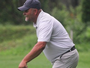 PETER RUICCI/Sault Star
   Don Martone takes some extra time looking over an eagle putt on No. 18 at Root River on Sunday. Martone settled for a tap-in birdie and a one-stroke victory in the Sault Ste. Marie City Golf Championship.