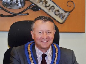 Huron County Warden Jim Ginn sits in the County of Huron Council Chambers during a meeting. Handout