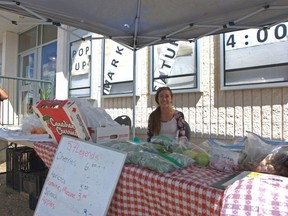 Ember Brewster grows the produce she proudly had on display at the July 18 Pop-Up Market which she has had a booth at in the past.