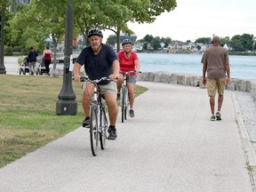 Cyclists are allowed on the trail in Point Edward that runs along the St. Clair River, but village officials are asking bike riders to remember to follow the rules. Paul Morden/Postmedia Network