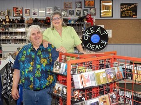 The husband and wife co-owners of Sarnia’s independent record store Cheeky Monkey, Roland and Mary Anne Peloza, pose for a picture in preparation for International Record Store Day. It will take place this year on three dates – Aug. 29, Sept. 26 and Oct. 24. Carl Hnatyshyn/Sarnia This Week