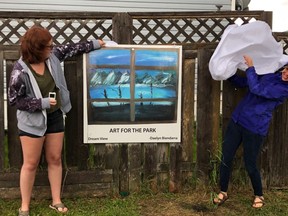 Daelyn Biendarra, left, used her like of painting to create "Dream View," which was for the Art for the Park project at the Clairmont Adventure Park in Clairmont, Alta. on Tuesday, July 28, 2020.