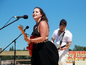 Brooklyn Doran performs alongside Cole Zabloski at the 12th 'Modified Maybe Annual' Coney Island Music Festival in July 2020.