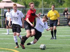 Christian Celebre, left, of Greater Sudbury Impact, and Jake Jones, of Barrie, battle for possession of the ball during an U17 boys Central Soccer League game at James Jerome Sports Complex in Sudbury, Ont. on Saturday June 6, 2015. Sudbury won 4-0.