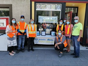 Staff and volunteers before the High River Farmers' Market on July 23.