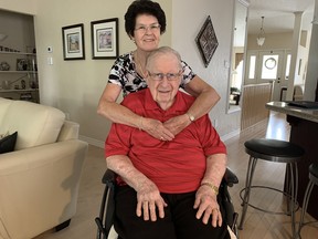 Leny and Ron Hardman, a retired Brant OPP officer, in their Brantford home. Just over 50 years ago, while on duty, he was hurt in a car crash that left five people dead, including his partner Const. Stefan Schultz.