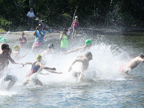 Swimmers hit the water for the Ian McCloy Island Swim at the university beach on Lake Nepahwin in this file photo.