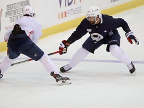 Washington Capitals defenseman Michal Kempny (6) defends as Capitals center Connor McMichael (24) skates with the puck during an NHL workout at MedStar Capitals Iceplex. (Geoff Burke-USA TODAY Sports)