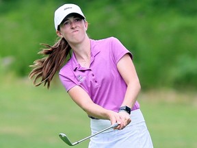 Brooke MacKinnon watches her shot on the 18th hole at Maple City Country Club during a Jamieson Junior Golf Tour event in Chatham, Ont., on Monday, July 27, 2020. Mark Malone/Chatham Daily News/Postmedia Network