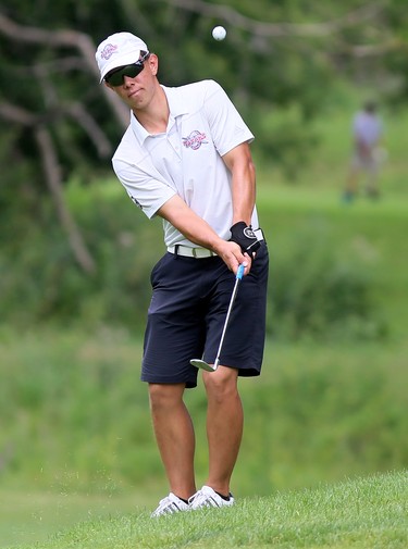 James Hill watches his shot on the 18th hole at Maple City Country Club during a Jamieson Junior Golf Tour event in Chatham, Ont., on Monday, July 27, 2020. Mark Malone/Chatham Daily News/Postmedia Network