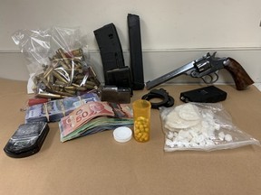 Officers seized what is suspected to be more than 120 grams of cocaine, a loaded .22 revolver, ammo, a stun gun, drug paraphernalia and an undisclosed amount of Canadian currency. Photo Supplied