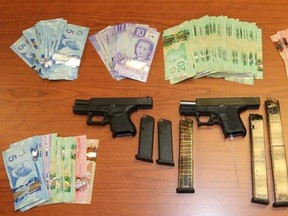 Police seized three guns, ammunition, drugs and currency. (OPP twitter)