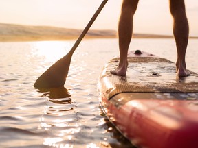 Paddle boarding is a fantastic fitness activity that easily allows for physical distancing. Getty Images