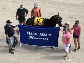 Dreaming Out Loud is joined in the winner's circle after the $16,200 Mark Austin Memorial Pacing Series final at Dresden Raceway in Dresden, Ont., on Sunday, July 12, 2020. (Contributed Photo)