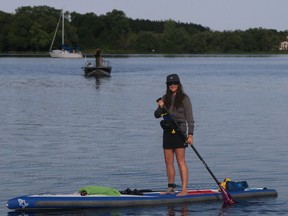 Rochelle Byrne, executive director of  A Greener Future, is pictured leaving the public boat launch in Northport as part of the Love Your Lake program to raise awareness about garbage in Lake Ontario. She plans to paddle from Kingston to Niagara-on-the-Lake during July. BRUCE BELL