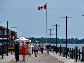 Residents taking a stroll along Bay of Quinte waters at Meyers Pier in Belleville. While social distancing is achievable in such situations and people are outside, Belleville city council will be discussing the possibility of making masks mandatory inside enclosed public areas and businesses during Monday's meeting.
DEREK BALDWIN