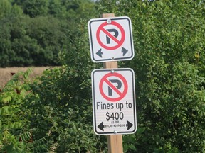 No parking signs line the west side of County Road 27 heading into North Beach Provincial Park. Prince Edward County council has changed both parking restrictions and fines in certain areas of the municipality in a bid to control parking at popular beaches. BRUCE BELL