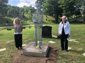Artist Danielle Reddick (left) and Glenwood Cemetery chairperson Sandy Latchford are pictured with the wire sculpture of a Second World War soldier unveiled Thursday morning. Located in the cemetery's Columbarium, the sculpture is to honour Second World War veterans. BRUCE BELL