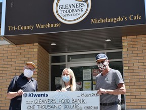 Belleville Kiwanians, Lt. Governor Ed Hawman (left) and President Ron Hare presented Gleaners Food Bank representative Virginia Williamson a cheque for $1,000. It was Kiwanis second $1,000 donation to the Food Bank since June. SUBMITTED PHOTO