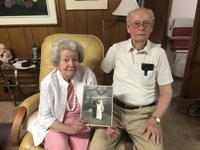 Well-known Belleville couple Barb and John Whelan are celebrating 72 years of marriage today (Friday). They are picture with a photograph from their wedding at Christ Church on July 17, 1948. BRUCE BELL