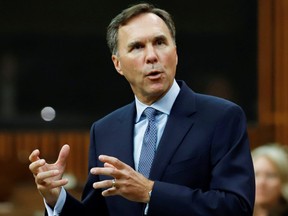Minister of Finance Bill Morneau answers a question about the Economic and Fiscal Snapshot in the House of Commons on Parliament Hill in Ottawa, Wednesday, July 8, 2020.
