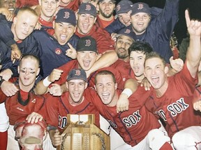 Members of the Brantford Red Sox celebrate their 2006 Intercounty Baseball League championship. Submitted