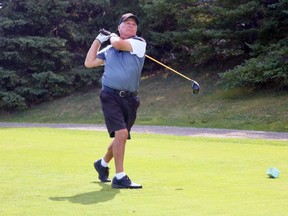 Golf courses have been reaping the benefits of contact sports being cancelled this summer, seeing more golfers than an average season. Howie Cornfoot tees off at The Greens at Renton on Thursday morning. ASHLEY TAYLOR