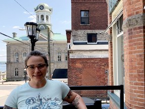 Nathalie Lavergne, a city councillor, poses on the patio of her business, the Spitfire Cafe, on Friday afternoon. (RONALD ZAJAC/The Recorder and Times)