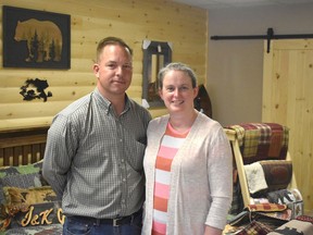 Owners of Cinnamon Cabin Co. Josh and Katherine McCarthy stand in their store days ahead of their official grand opening. Daniel Caudle