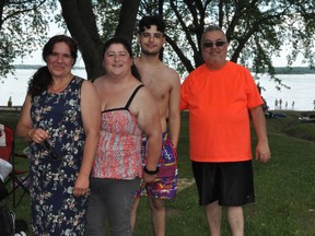 Natalina Cianci, Sonia Mosca, Nicola Matteo Ferrante and Francesco Ferrante all came down from Montreal in order to enjoy the sunshine at the Milles Roche Beach on Wednesday July 1, 2020 in Cornwall, Ont. Francis Racine/Cornwall Standard-Freeholder/Postmedia Network