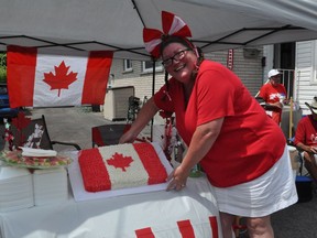 Following the singing of the anthem, the group were rewarded with a Canadian flag cake. Photo taken on Wednesday July 1, 2020 in Cornwall, Ont. Francis Racine/Cornwall Standard-Freeholder/Postmedia Network